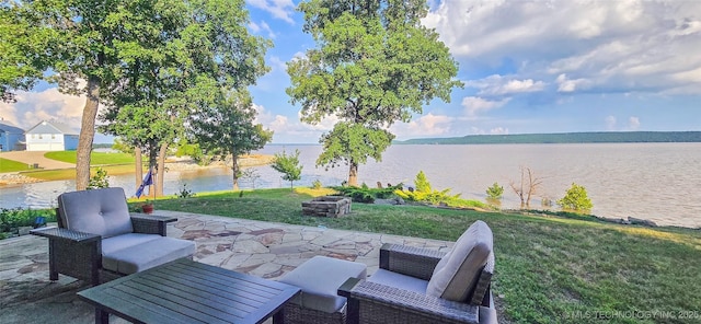 117189 S 4238th Rd, Eufaula, OK 74432 - view of patio / terrace with a water view and an outdoor living space with a fire pit