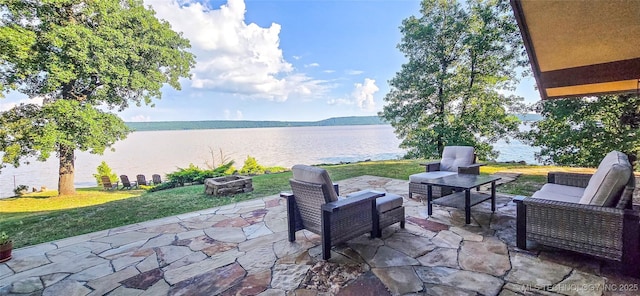 117189 S 4238th Rd, Eufaula, OK 74432 - view of patio / terrace featuring a water view and an outdoor living space with a fire pit