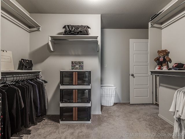 2008 E Union St, Broken Arrow, OK 74011 - walk in closet featuring carpet