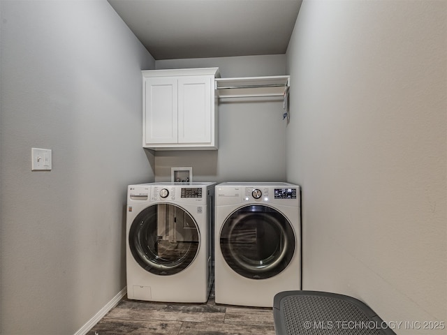 2008 E Union St, Broken Arrow, OK 74011 - washroom with cabinet space, washer and dryer, and wood finished floors