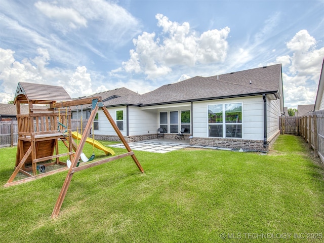 2008 E Union St, Broken Arrow, OK 74011 - back of property with a playground, a patio, a fenced backyard, and a shingled roof