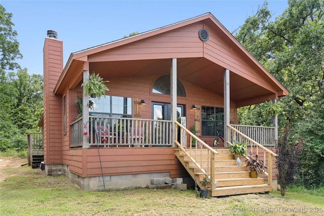 14629 E 233rd St S, Webbers Falls, OK 74470 - view of front of property with a chimney, covered porch, and stairs