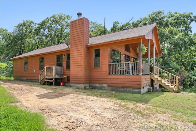 14629 E 233rd St S, Webbers Falls, OK 74470 - view of side of home with stairs and a chimney
