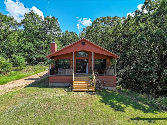 14629 E 233rd St S, Webbers Falls, OK 74470 - view of front of house with a chimney, a front yard, driveway, and stairs