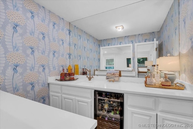 5824 S Louisville Ave, Tulsa, OK 74135 - indoor dry bar featuring wine cooler and wallpapered walls