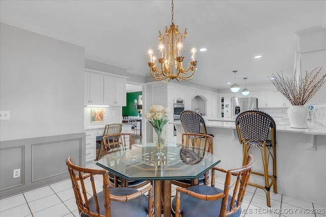 5824 S Louisville Ave, Tulsa, OK 74135 - dining area featuring light tile patterned floors, a chandelier, recessed lighting, and crown molding