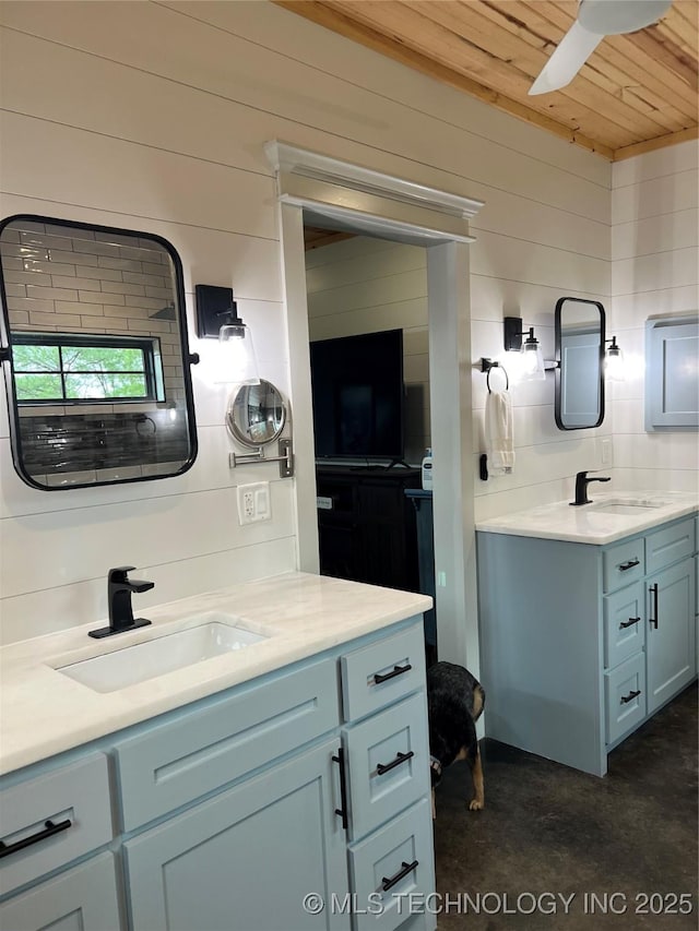 13425 SW 1025th Ave, Tuskahoma, OK 74571 - bathroom with wood ceiling, vanity, wooden walls, and concrete flooring