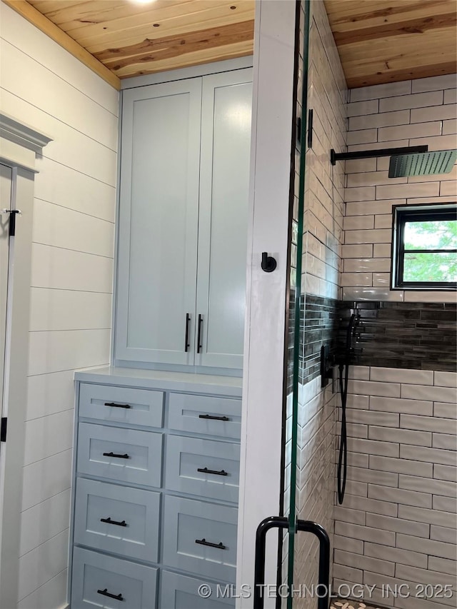 13425 SW 1025th Ave, Tuskahoma, OK 74571 - full bath with wooden ceiling, a stall shower, and wooden walls