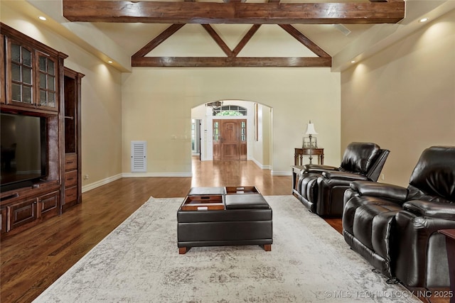 509 E Glendale St, Broken Arrow, OK 74011 - cinema room featuring arched walkways, wood finished floors, beamed ceiling, and recessed lighting