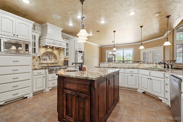 509 E Glendale St, Broken Arrow, OK 74011 - kitchen featuring premium range hood, appliances with stainless steel finishes, tasteful backsplash, light tile patterned flooring, and recessed lighting