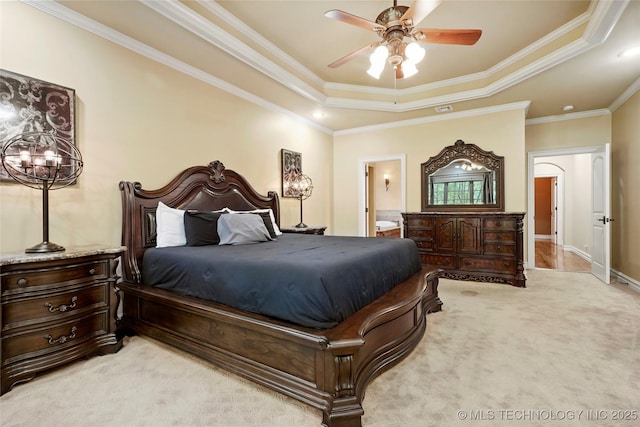 509 E Glendale St, Broken Arrow, OK 74011 - bedroom with a tray ceiling, light colored carpet, crown molding, ensuite bathroom, and ceiling fan