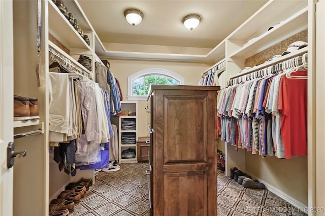 509 E Glendale St, Broken Arrow, OK 74011 - spacious closet featuring a raised ceiling