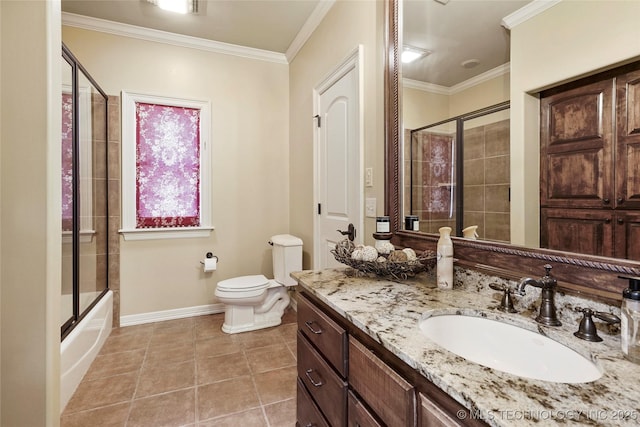 509 E Glendale St, Broken Arrow, OK 74011 - bathroom featuring vanity, tile patterned flooring, ornamental molding, and enclosed tub / shower combo