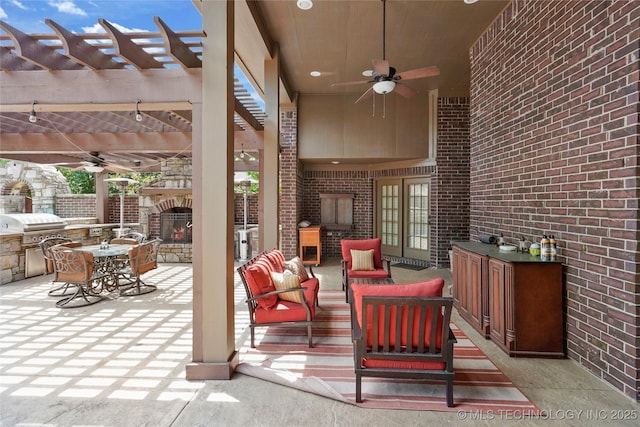 509 E Glendale St, Broken Arrow, OK 74011 - view of patio / terrace featuring an outdoor kitchen, ceiling fan, a pergola, and an outdoor living space with a fireplace