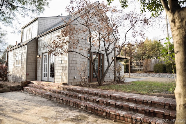 1207 E 21st Pl, Tulsa, OK 74114 - view of property exterior featuring a patio