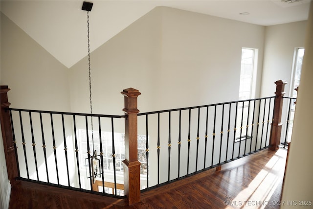 1207 E 21st Pl, Tulsa, OK 74114 - stairway featuring wood finished floors and lofted ceiling