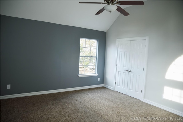 1207 E 21st Pl, Tulsa, OK 74114 - unfurnished bedroom featuring carpet, a closet, a ceiling fan, and high vaulted ceiling
