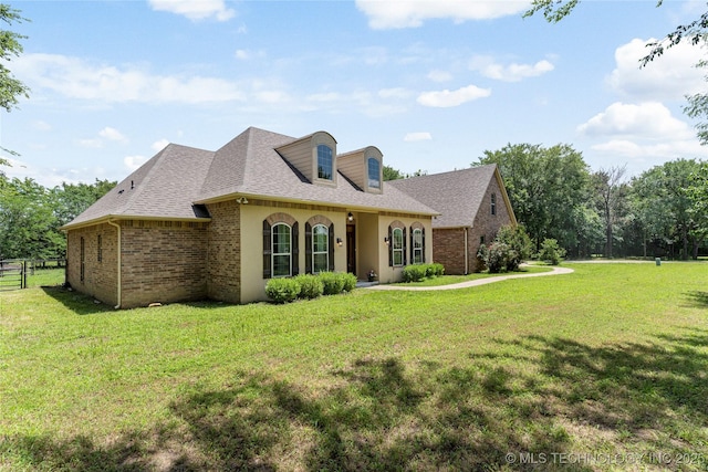13559 E 463rd Rd, Claremore, OK 74017 - view of front of house featuring brick siding and a shingled roof