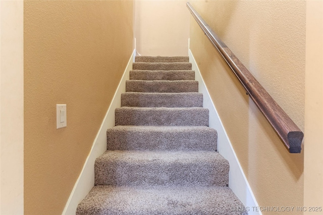13559 E 463rd Rd, Claremore, OK 74017 - staircase featuring a textured wall and carpet flooring