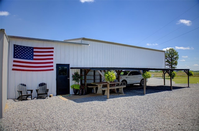 9449 S 74th St W, Oktaha, OK 74450 - view of parking with a carport