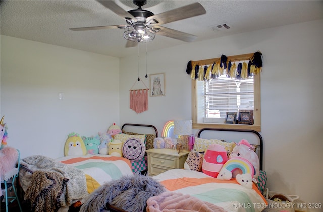 9449 S 74th St W, Oktaha, OK 74450 - bedroom featuring a textured ceiling and ceiling fan