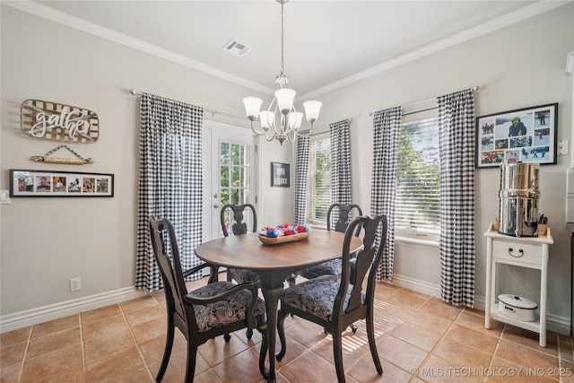 4005 Frontier Rd, Sapulpa, OK 74066 - dining area with a chandelier, light tile patterned flooring, plenty of natural light, and ornamental molding