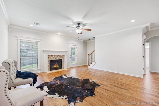 3604 W 109th St S, Jenks, OK 74037 - living room featuring a ceiling fan, healthy amount of natural light, a tile fireplace, light wood-style floors, and recessed lighting