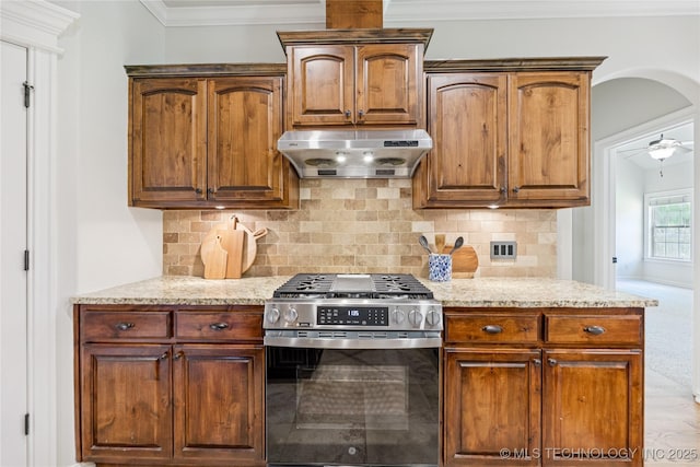 3604 W 109th St S, Jenks, OK 74037 - kitchen with gas range, extractor fan, light stone counters, tasteful backsplash, and crown molding