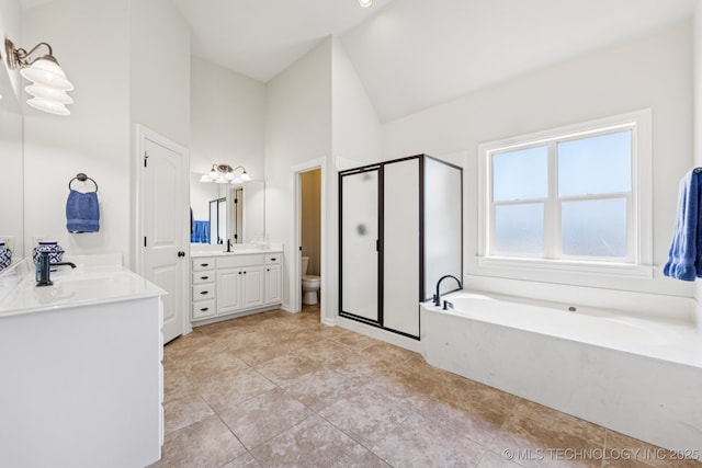 3604 W 109th St S, Jenks, OK 74037 - bathroom with a bath, a stall shower, two vanities, high vaulted ceiling, and tile patterned floors