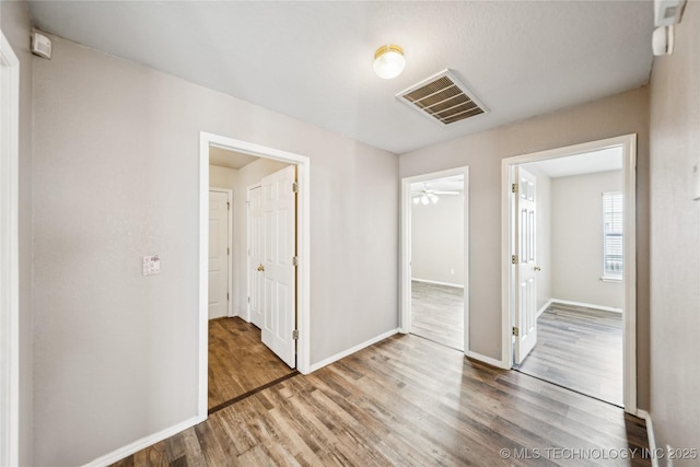 4728 S 196th Ave E, Broken Arrow, OK 74014 - spare room featuring wood finished floors and ceiling fan