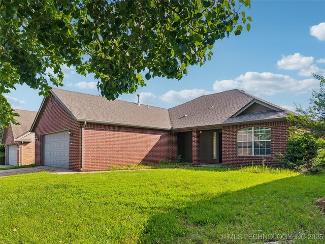 4728 S 196th Ave E, Broken Arrow, OK 74014 - single story home with brick siding, roof with shingles, a front yard, and a garage