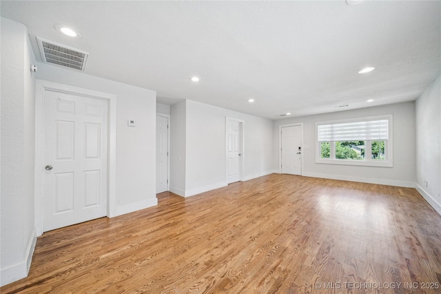 241 S Richmond Ave, Tulsa, OK 74112 - empty room featuring light wood-style floors and recessed lighting