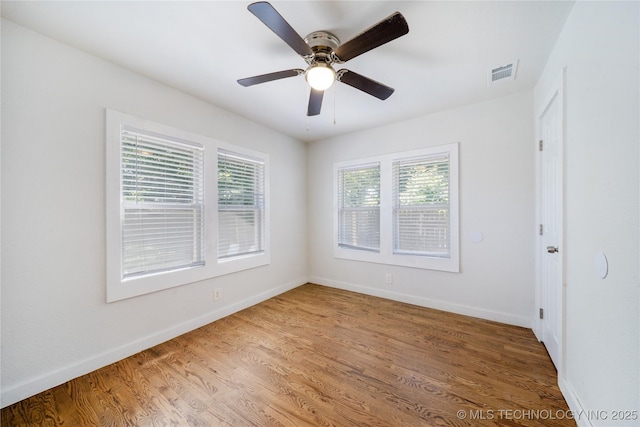 241 S Richmond Ave, Tulsa, OK 74112 - unfurnished room with wood finished floors and a ceiling fan
