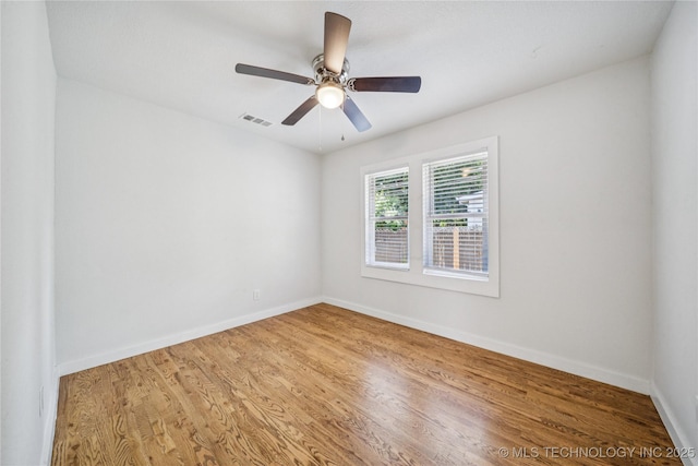 241 S Richmond Ave, Tulsa, OK 74112 - unfurnished room with wood finished floors and ceiling fan