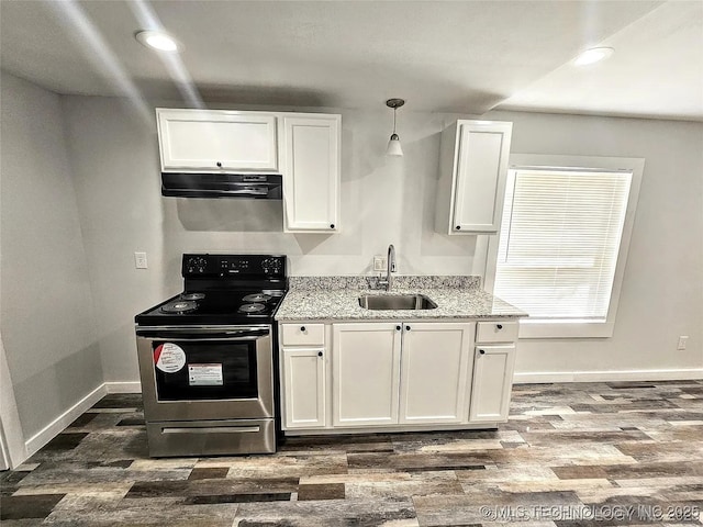 241 S Richmond Ave, Tulsa, OK 74112 - kitchen featuring range with electric cooktop, under cabinet range hood, white cabinets, dark wood-style flooring, and recessed lighting