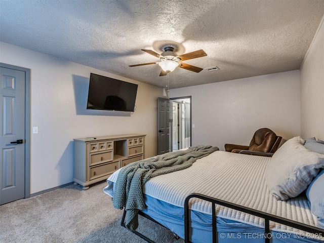 6708 S 5th St, Broken Arrow, OK 74011 - bedroom with light carpet, a ceiling fan, and a textured ceiling
