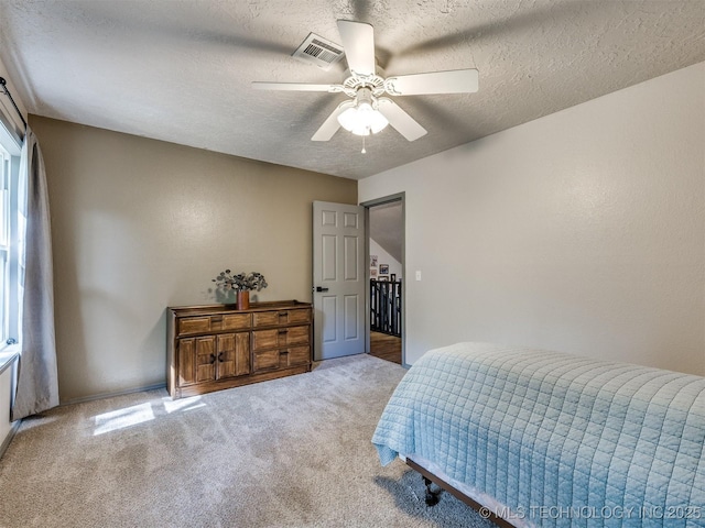 6708 S 5th St, Broken Arrow, OK 74011 - bedroom featuring carpet flooring, a textured ceiling, and ceiling fan