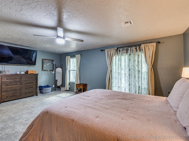 6708 S 5th St, Broken Arrow, OK 74011 - carpeted bedroom with a ceiling fan