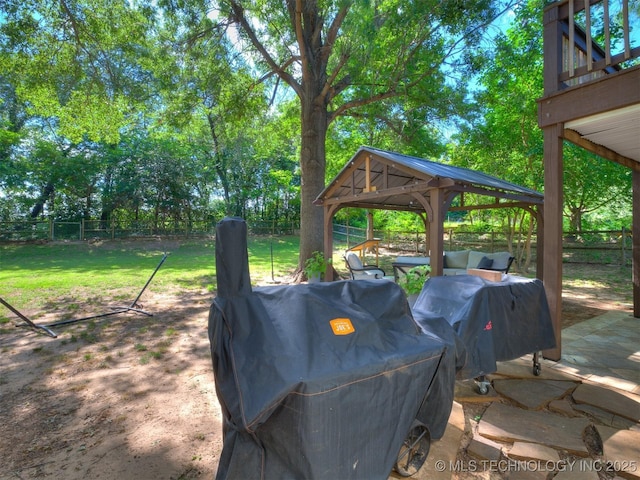 6708 S 5th St, Broken Arrow, OK 74011 - fenced backyard featuring a gazebo, an outdoor living space, and area for grilling