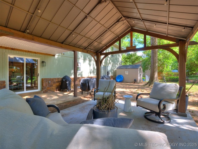6708 S 5th St, Broken Arrow, OK 74011 - view of patio featuring a shed and grilling area