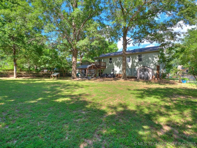 6708 S 5th St, Broken Arrow, OK 74011 - view of yard with a storage unit and a deck