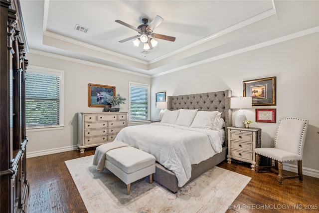 11029 S Kennedy St, Jenks, OK 74037 - bedroom with a raised ceiling, dark wood-style flooring, ornamental molding, and ceiling fan