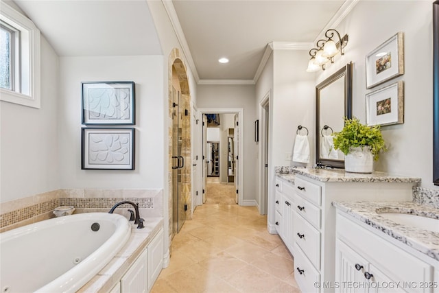 11029 S Kennedy St, Jenks, OK 74037 - full bathroom with two vanities, a stall shower, a jetted tub, ornamental molding, and recessed lighting