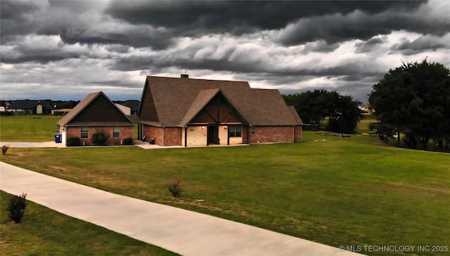 6865 Wilson St, Durant, OK 74701 - view of front of house with a front lawn and brick siding
