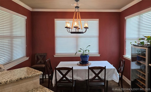 6865 Wilson St, Durant, OK 74701 - dining area featuring wine cooler, dark wood-type flooring, healthy amount of natural light, and crown molding