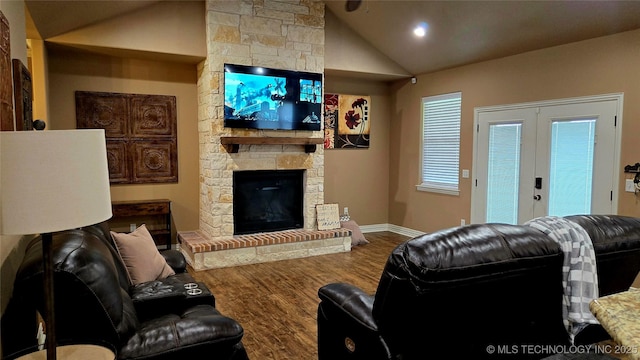 6865 Wilson St, Durant, OK 74701 - living room featuring vaulted ceiling, wood finished floors, a fireplace, and recessed lighting
