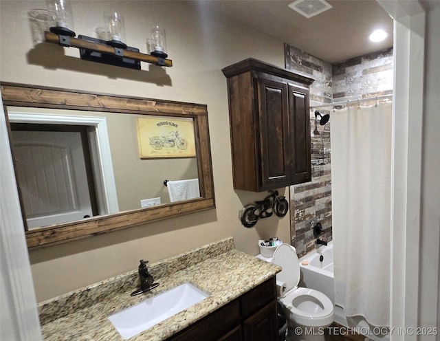 6865 Wilson St, Durant, OK 74701 - full bathroom featuring vanity and shower / bath combo with shower curtain