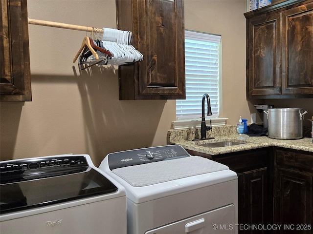 6865 Wilson St, Durant, OK 74701 - laundry room with separate washer and dryer and cabinet space