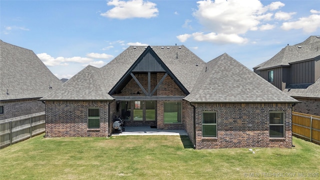 5906 E 126th Pl S, Bixby, OK 74008 - rear view of property with brick siding, a fenced backyard, a patio area, and roof with shingles