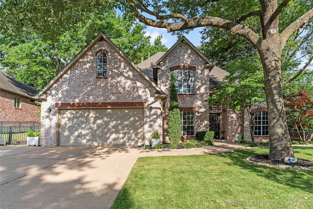 12511 S 18th Cir E, Jenks, OK 74037 - view of front facade with brick siding, driveway, and a garage